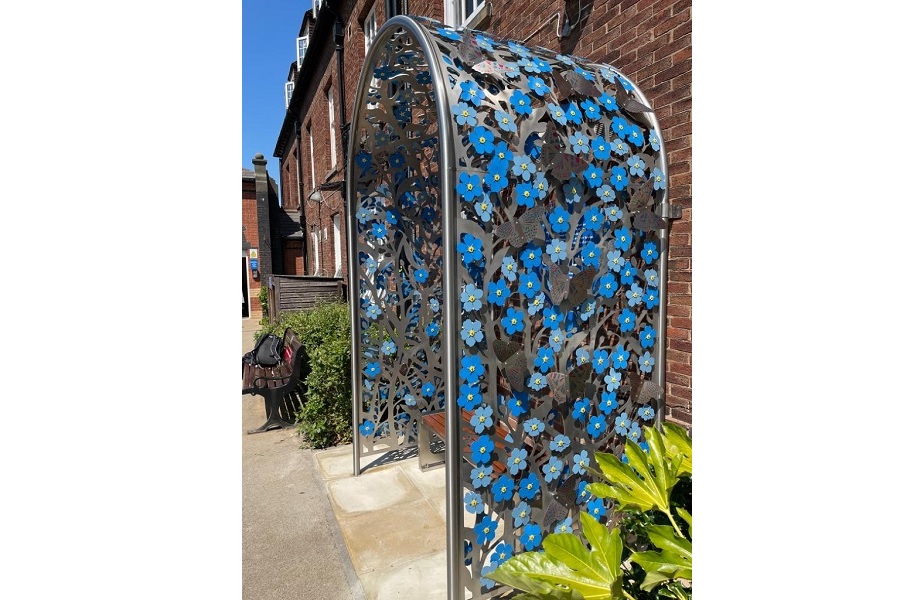 Butterflies and forget-me-nots adorn commemorative artwork